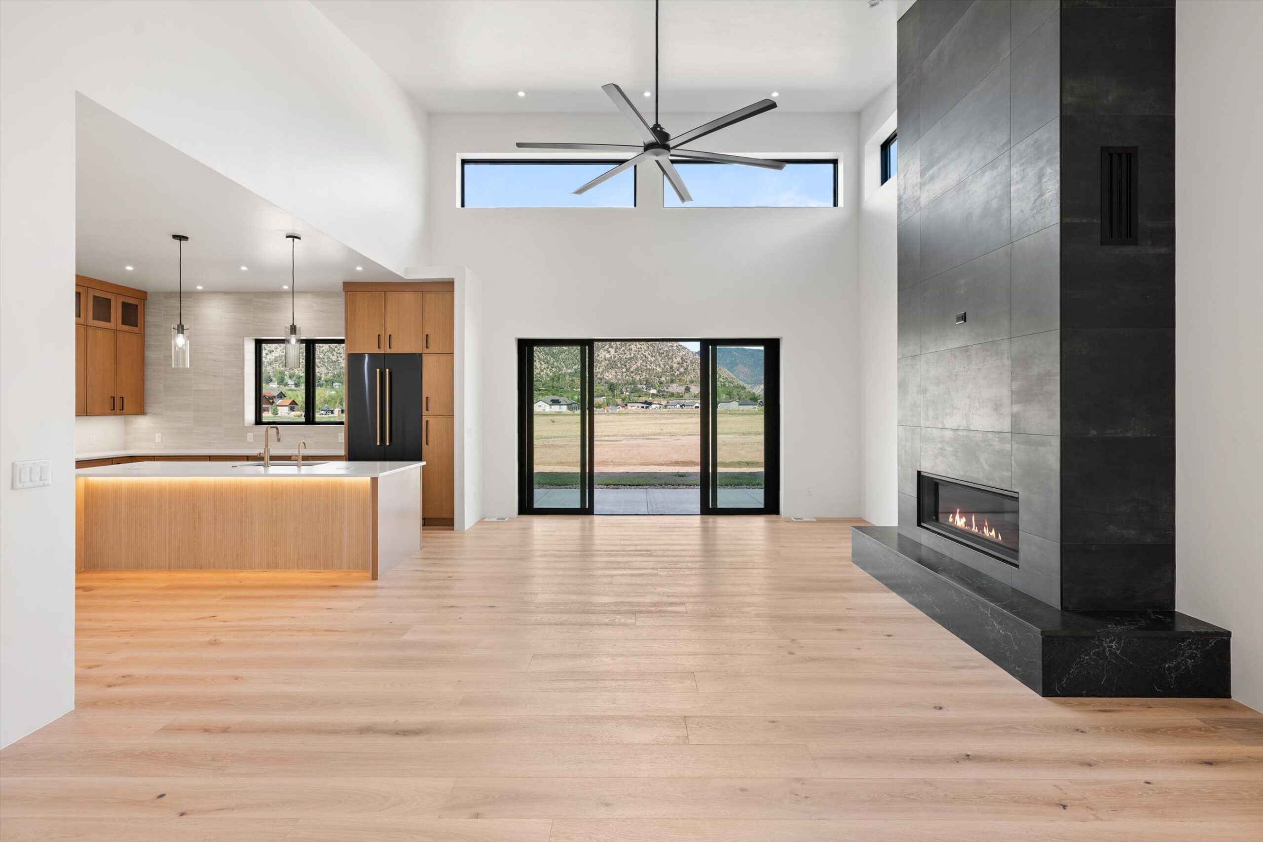 Great room with fireplace and mountain-view doors