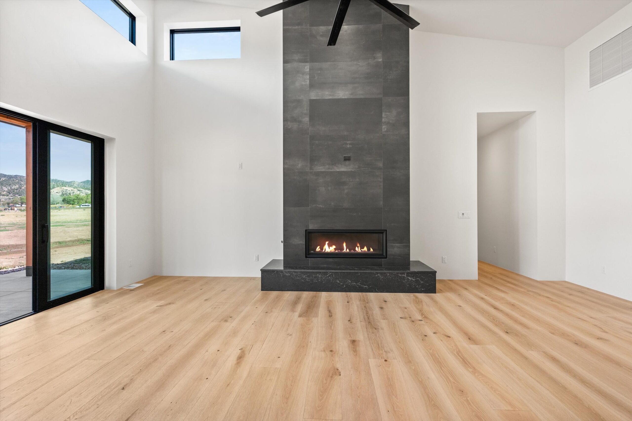 Linear gas fireplace with tile surround