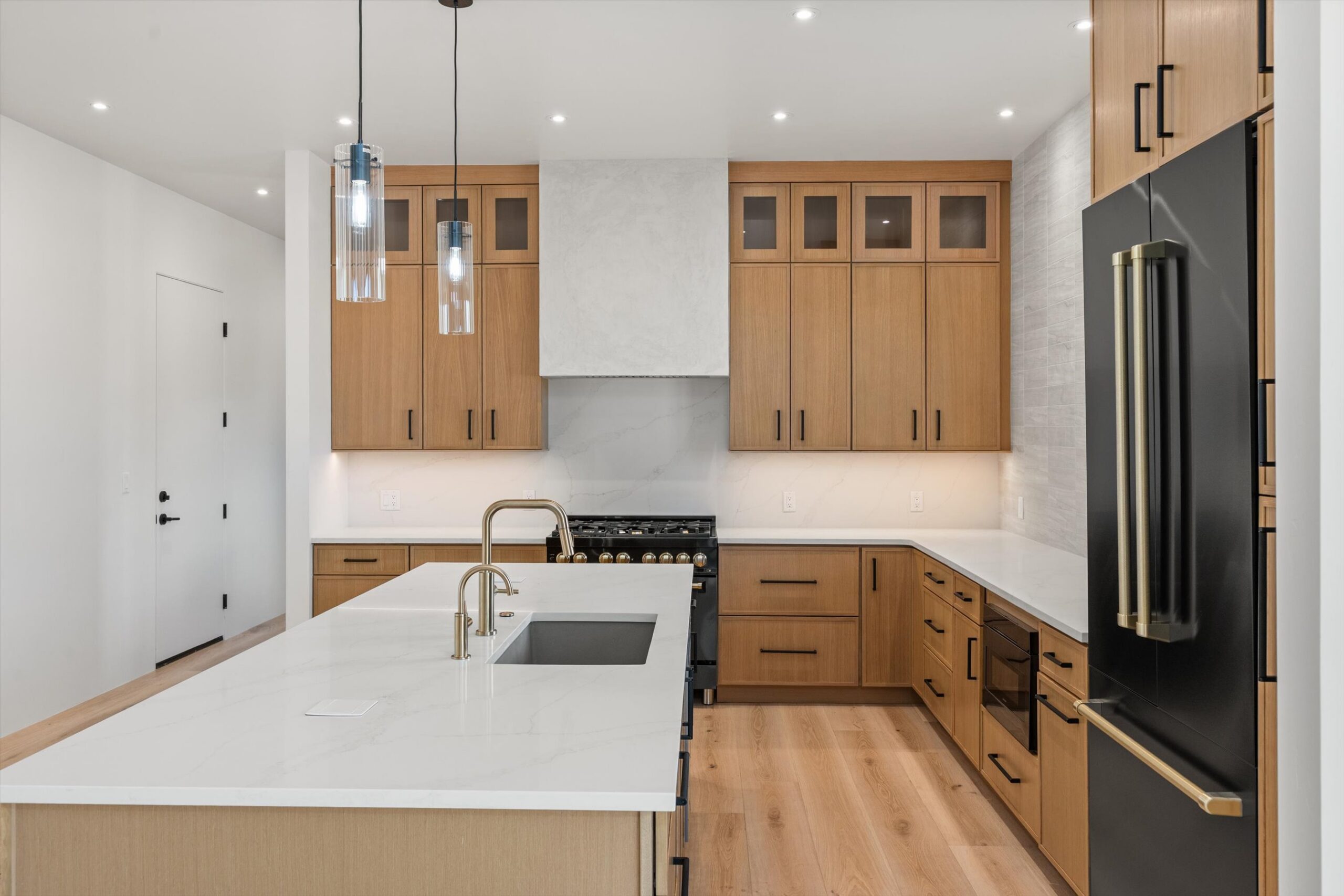 Custom range hood and cabinetry detail