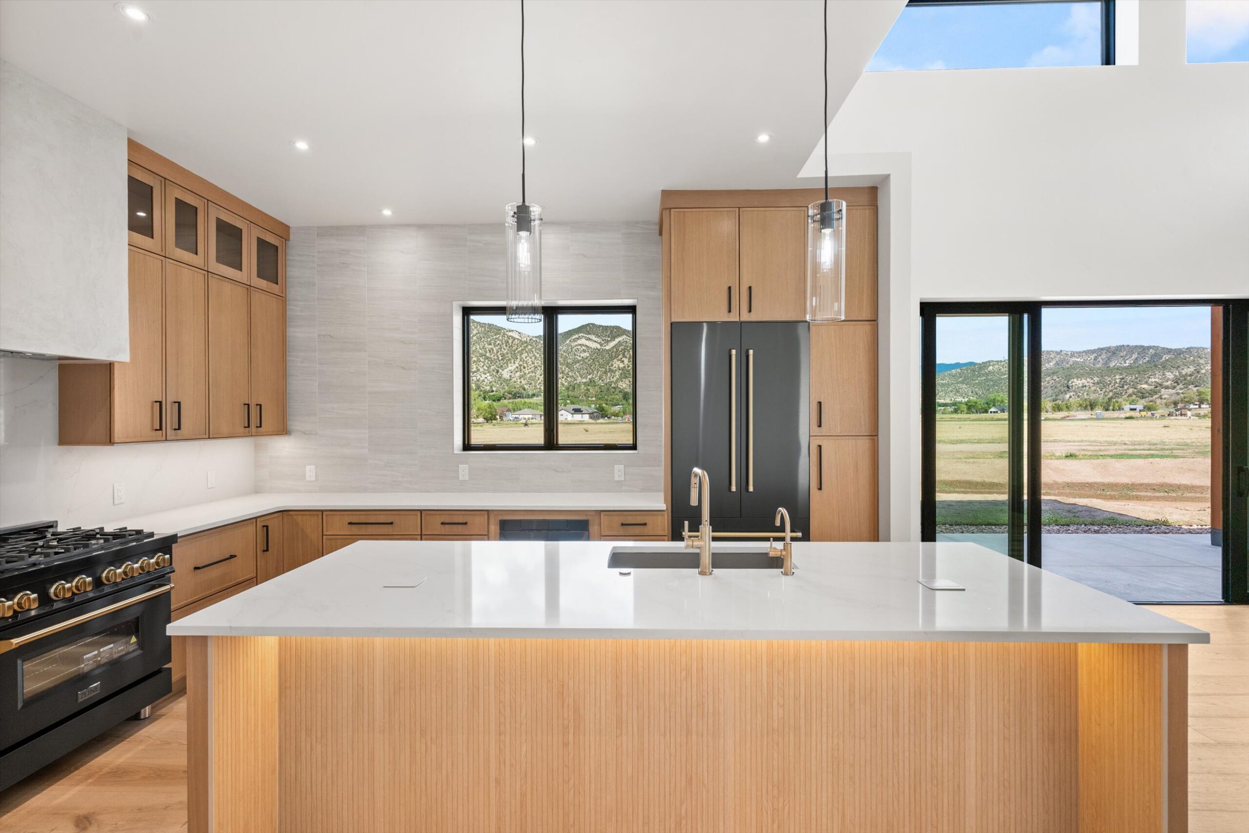 Kitchen with mountain-view window over sink