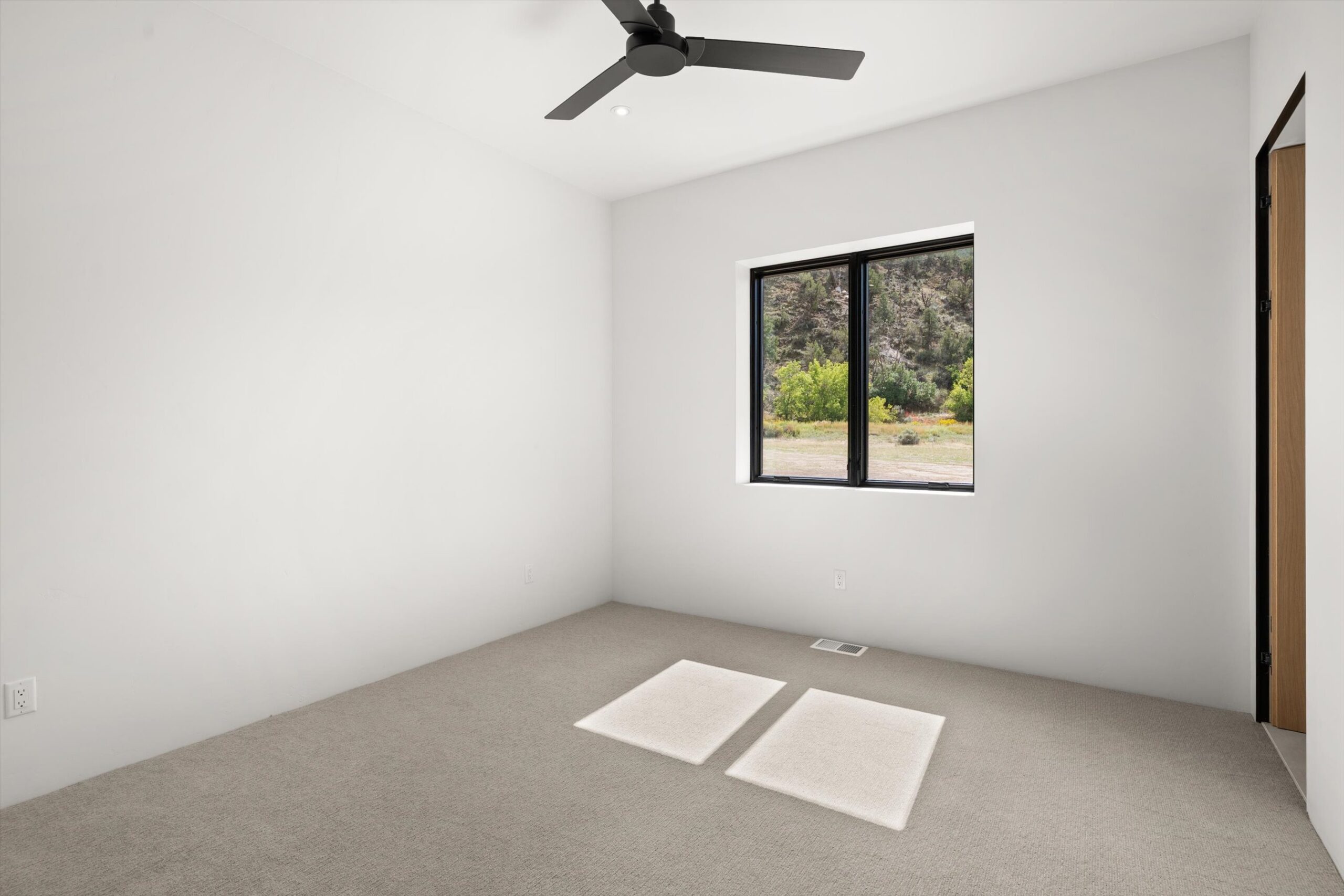 Secondary bedroom with mountain-view window