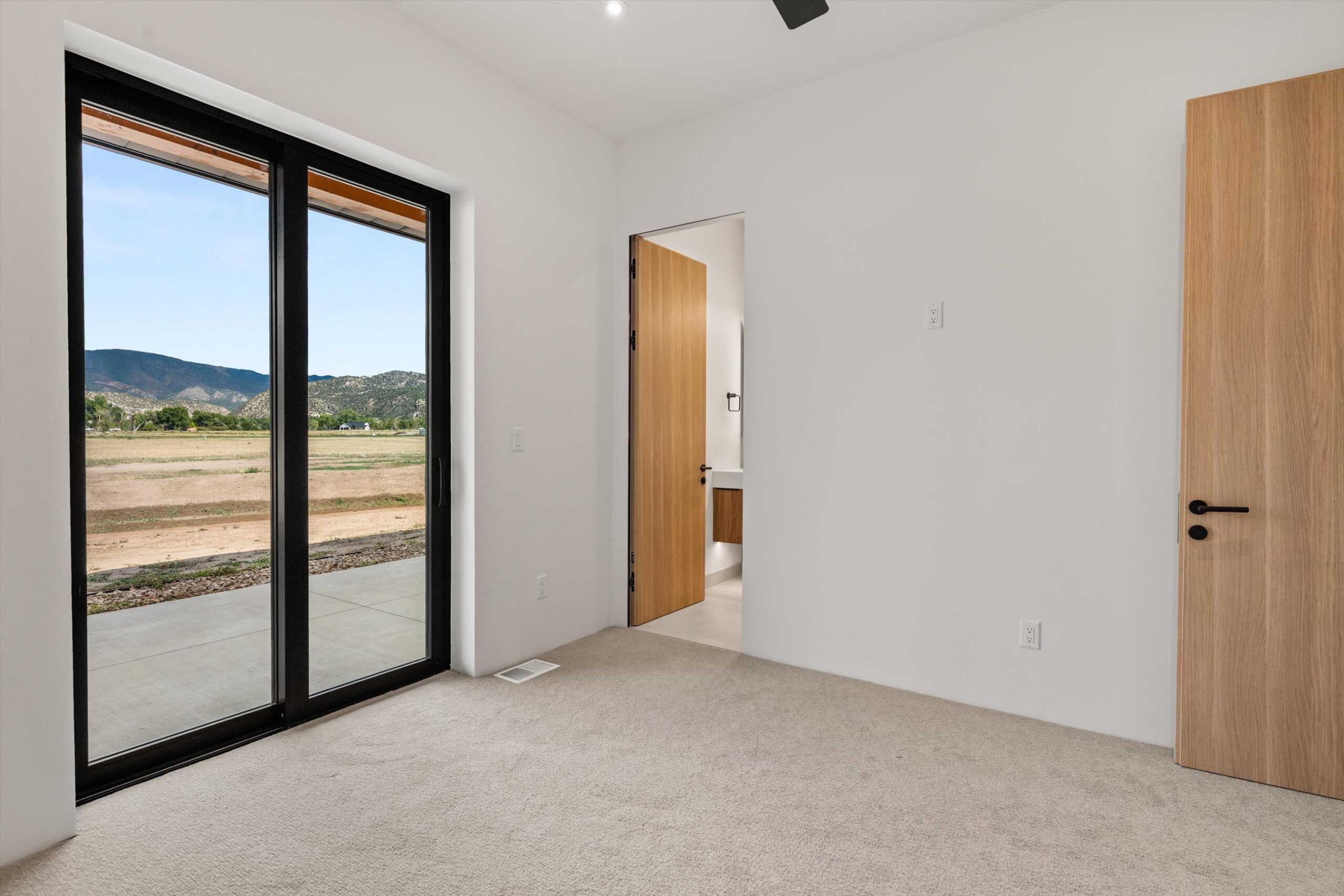 Secondary bedroom with door to ensuite bath